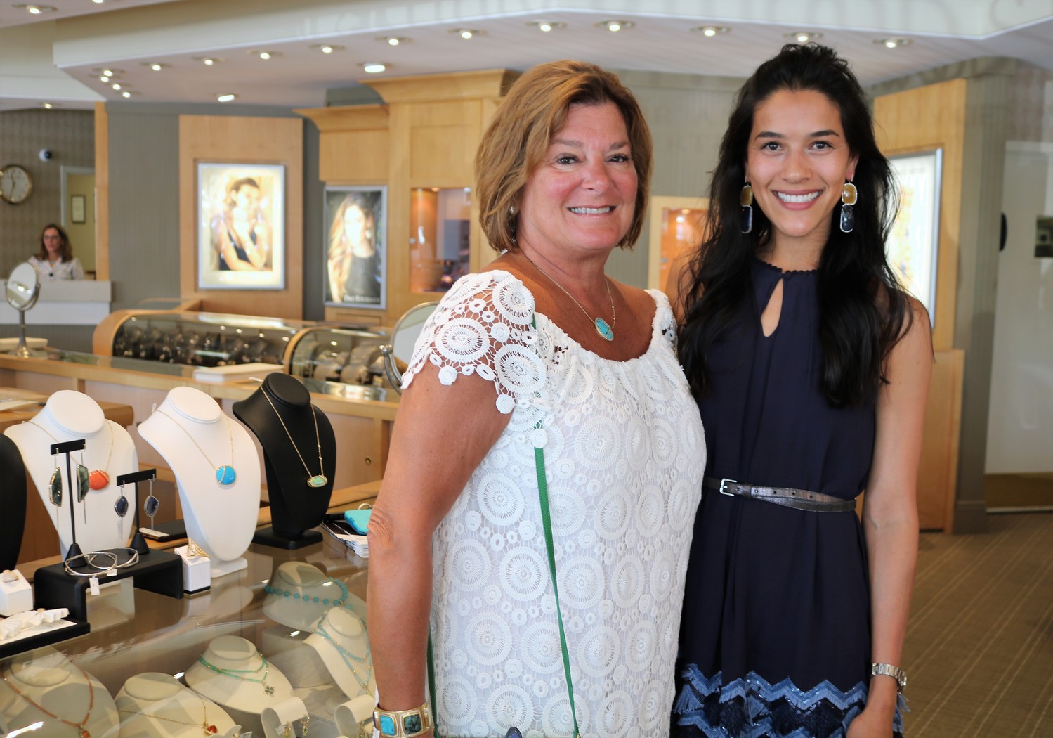 Dao Fournier co-creator and jewelry designer Lucy Price (right) models her pieces with Christy Bromberg at the May 9 luncheon for the PGA Tour Wives Association at Underwood Jeweler’s in Ponte Vedra Beach.